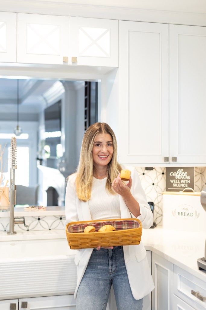 picture of dr ally smiling with fruit